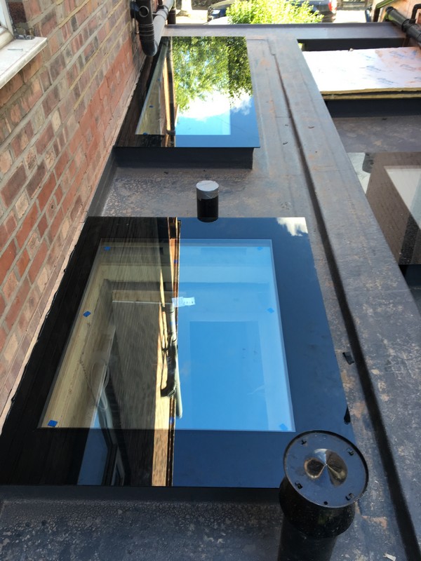Multiple flat roof skylights on extension in Greenford